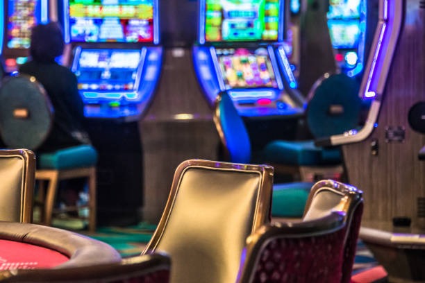 Bikini Paradise paytable and game settings on joker123 slot showing stake controls and payline options